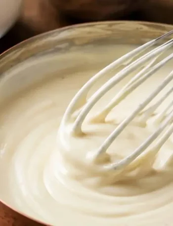 Creamy béchamel sauce in a bowl