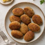 Golden Mondeghili Milanesi with beef, liver mortadella, and Parmigiano Reggiano